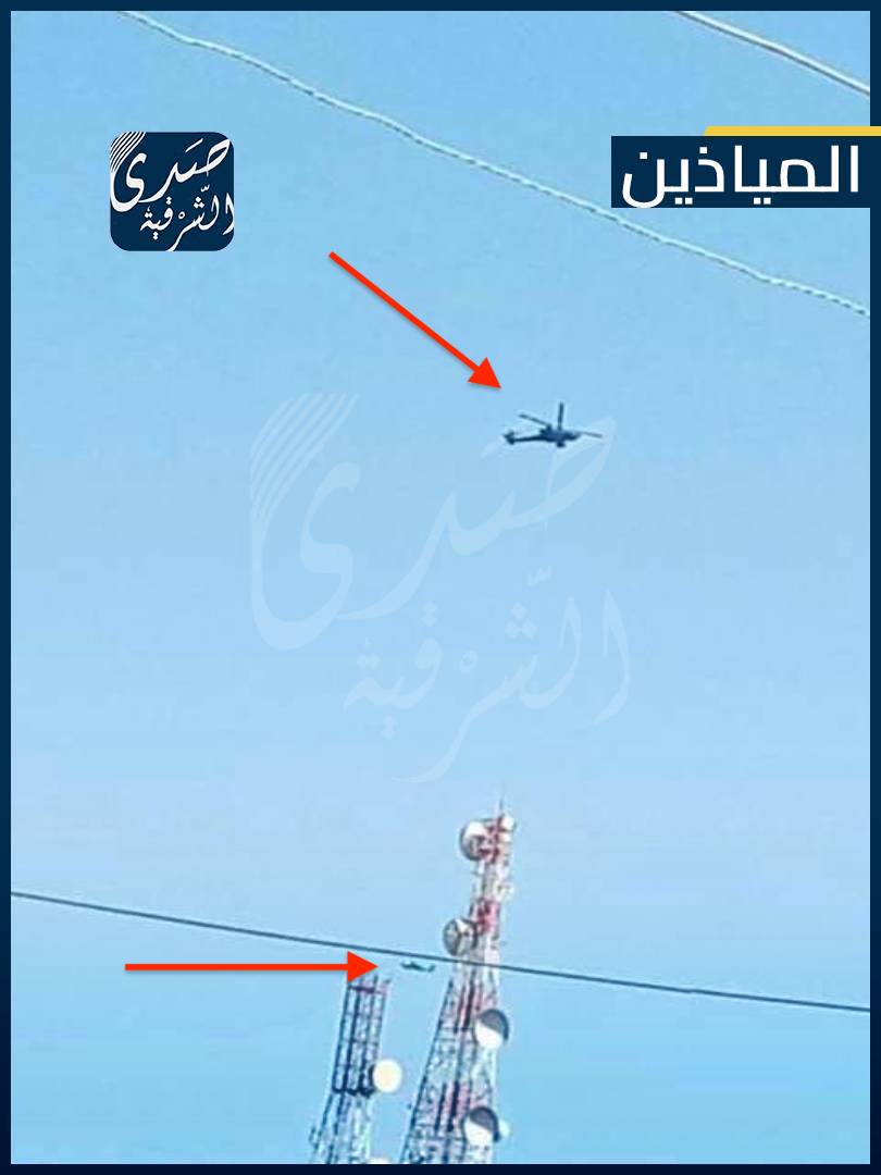 Helicopters of the international coalition led by the United States fly over the city of Mayadin, which is now under the control of the Iranian militias. The picture shows the communications tower and two helicopters belonging to the coalition forces
