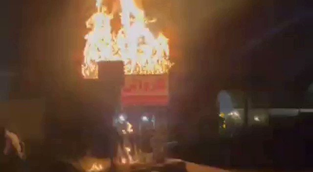 Saqqez, western Iran, Sa'adi Street: Protesters in the hometown of MahsaAmini torched a banner of Qassem Soleimani
