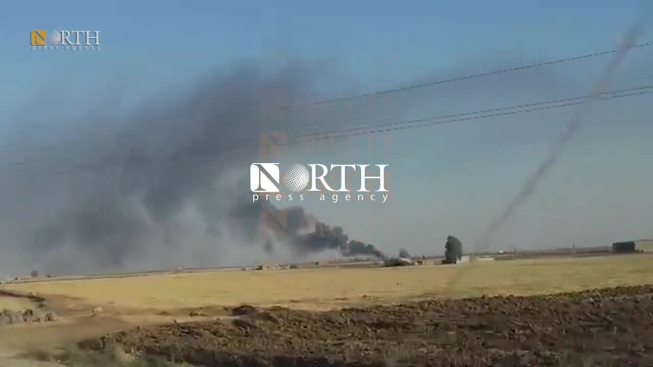 Smoke rising from an oil field in Tirbe Spiyeh (al-Qahtaniya) town in Northeast Syria due to Turkish airstrike.