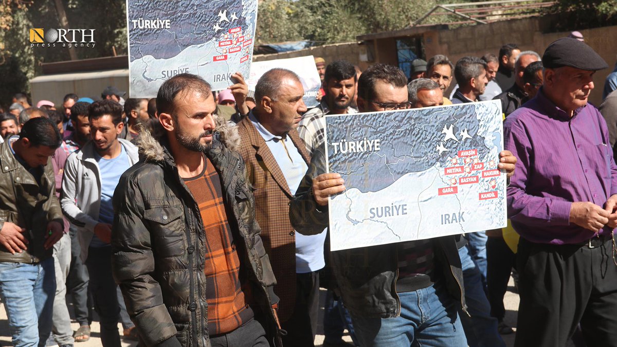 Residents of the town of Tel Tamr in Hasakah country in northeastern Syria protest and condemn Turkish airstrikes in the area