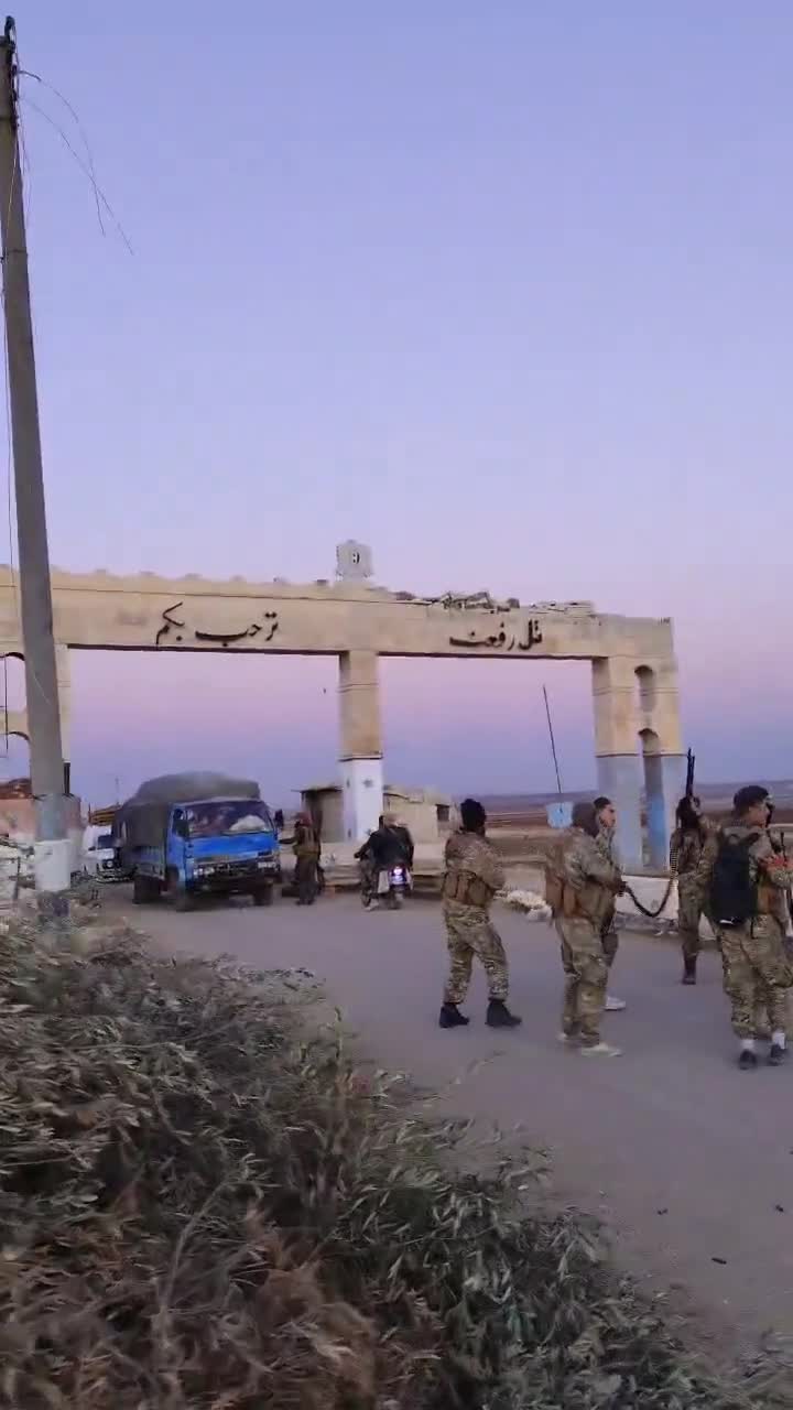 Tal Rifaat is reportedly captured by Turkey-backed rebels as they pose outside the town entrance