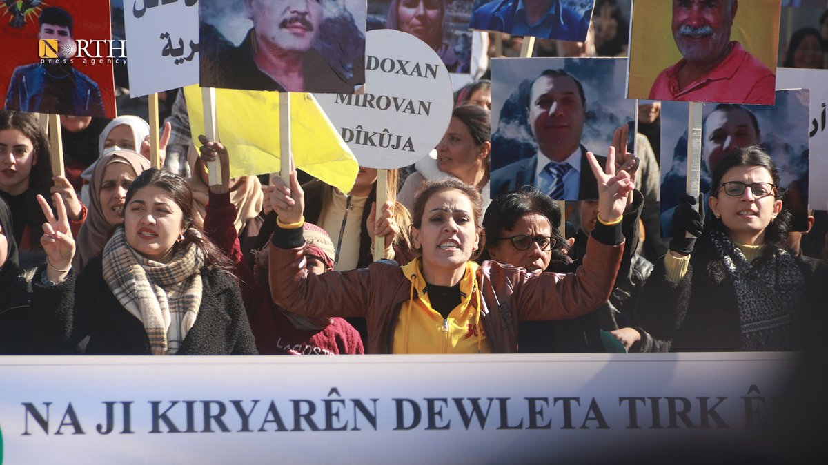 Residents of Hasakah city in NE_Syria gather in front of the @coalition base to protest against Turkey's strikes on the region